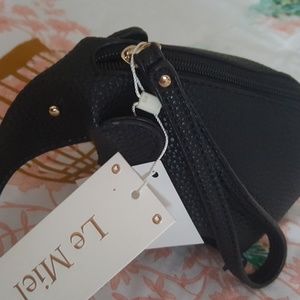 Black & gold elephant shaped vegan wristlet